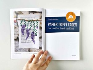 Papier trifft Faden – Buchseiten bunt bestickt von Anka Brüggemann