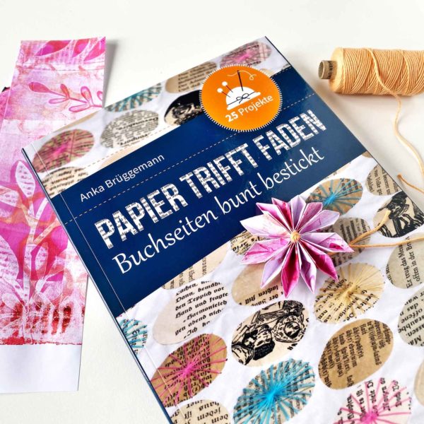 Papier trifft Faden – Buchseiten bunt bestickt