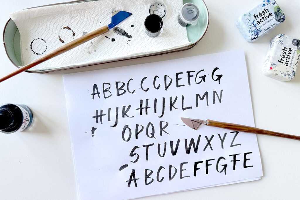 Cola-Feder-Alphabet