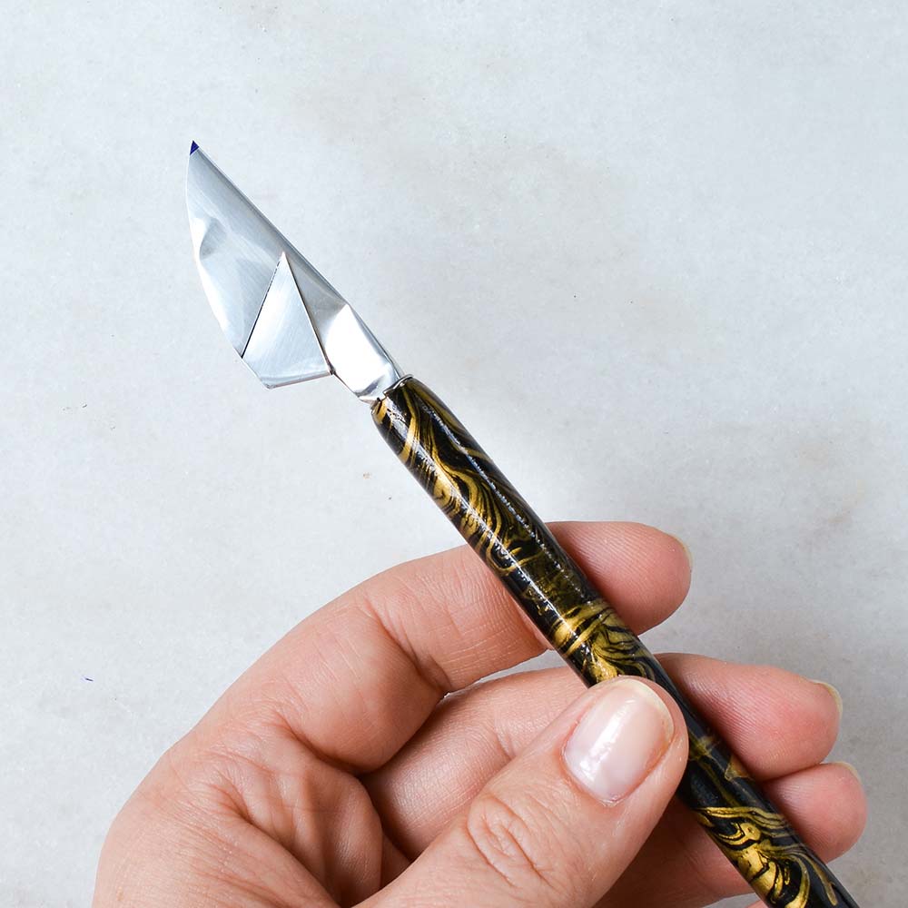 So sieht eine Cola-Feder (Cola Pen) aus.